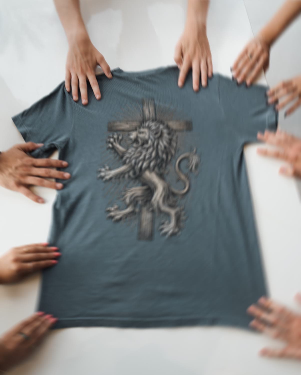Many hands holding up the Repentance is a Gift tee